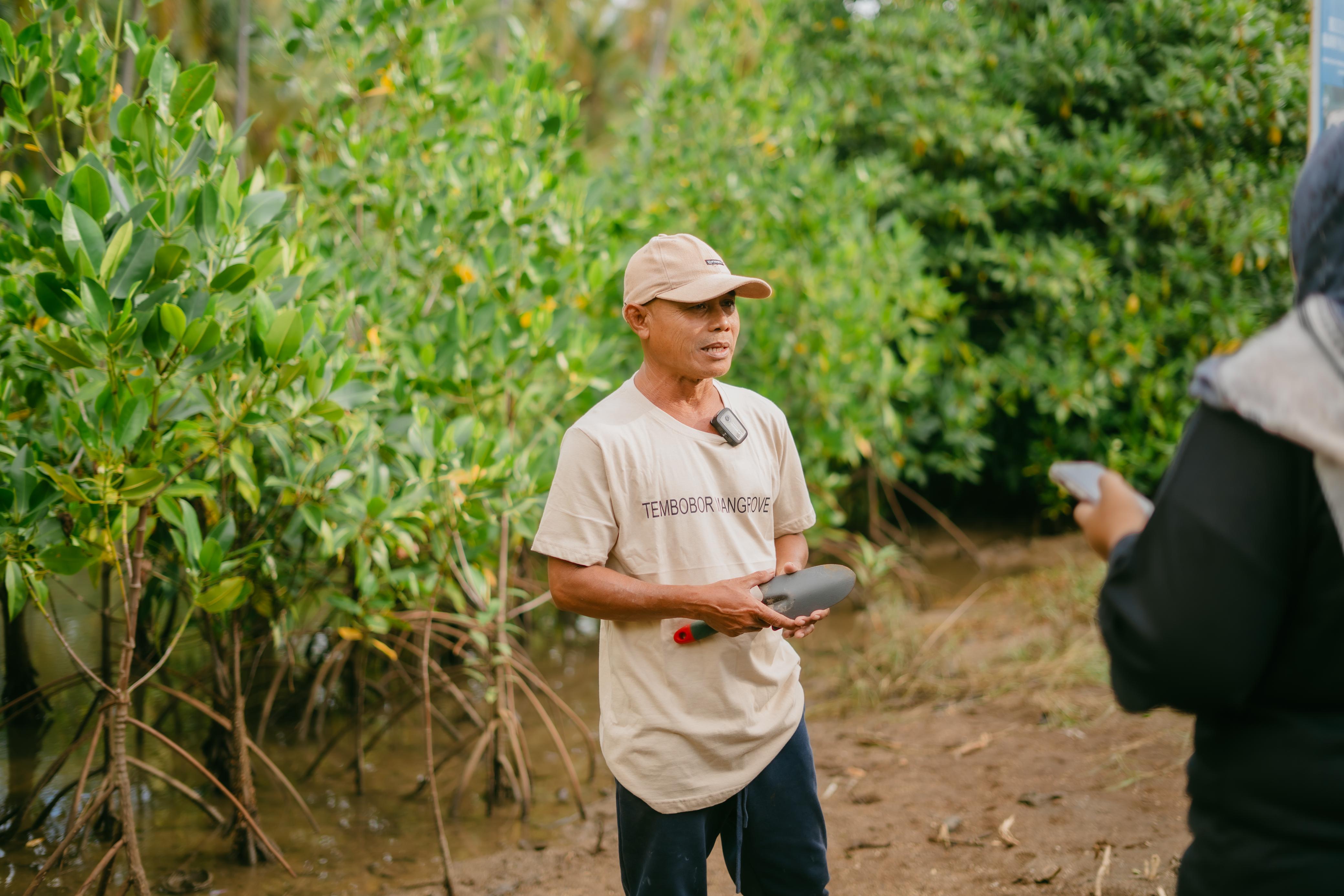 Jumar, the community’s local hero, has cared for this mangrove ecosystem since 2010. His story reflects the power of community-driven environmental action.